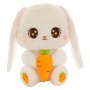 Lapin en peluche aux longues oreilles avec carotte, doux et moelleux, idéal comme cadeau pour enfants.